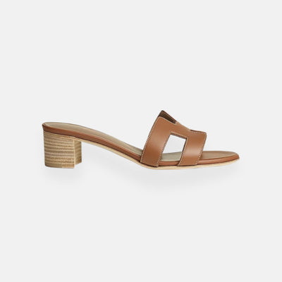 Clara – Mules traforate con tacco basso