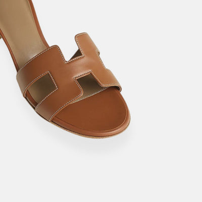 Clara – Mules traforate con tacco basso