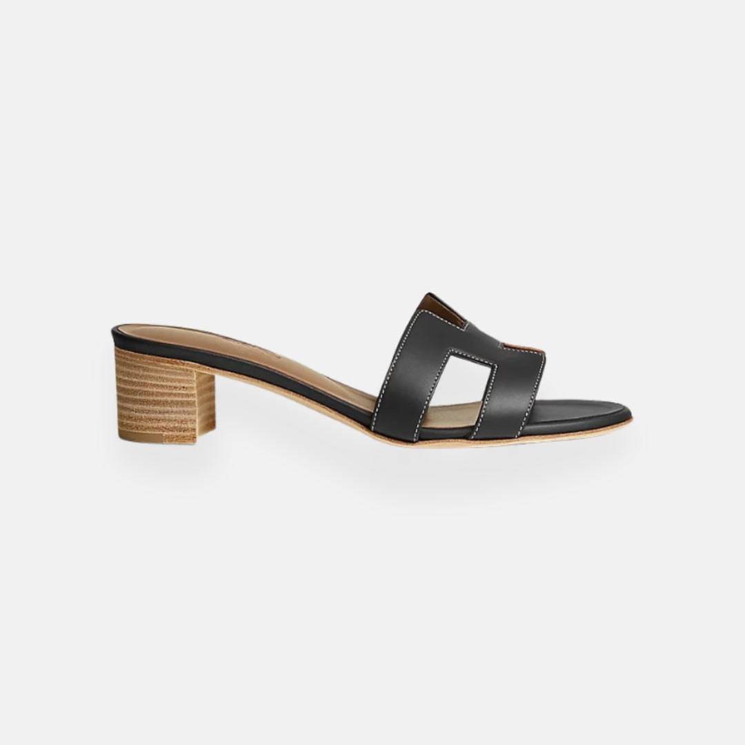 Clara – Mules traforate con tacco basso