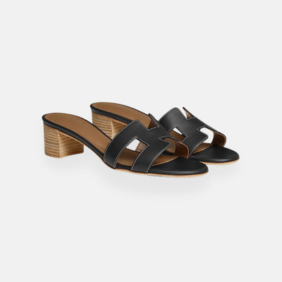 Clara – Mules traforate con tacco basso