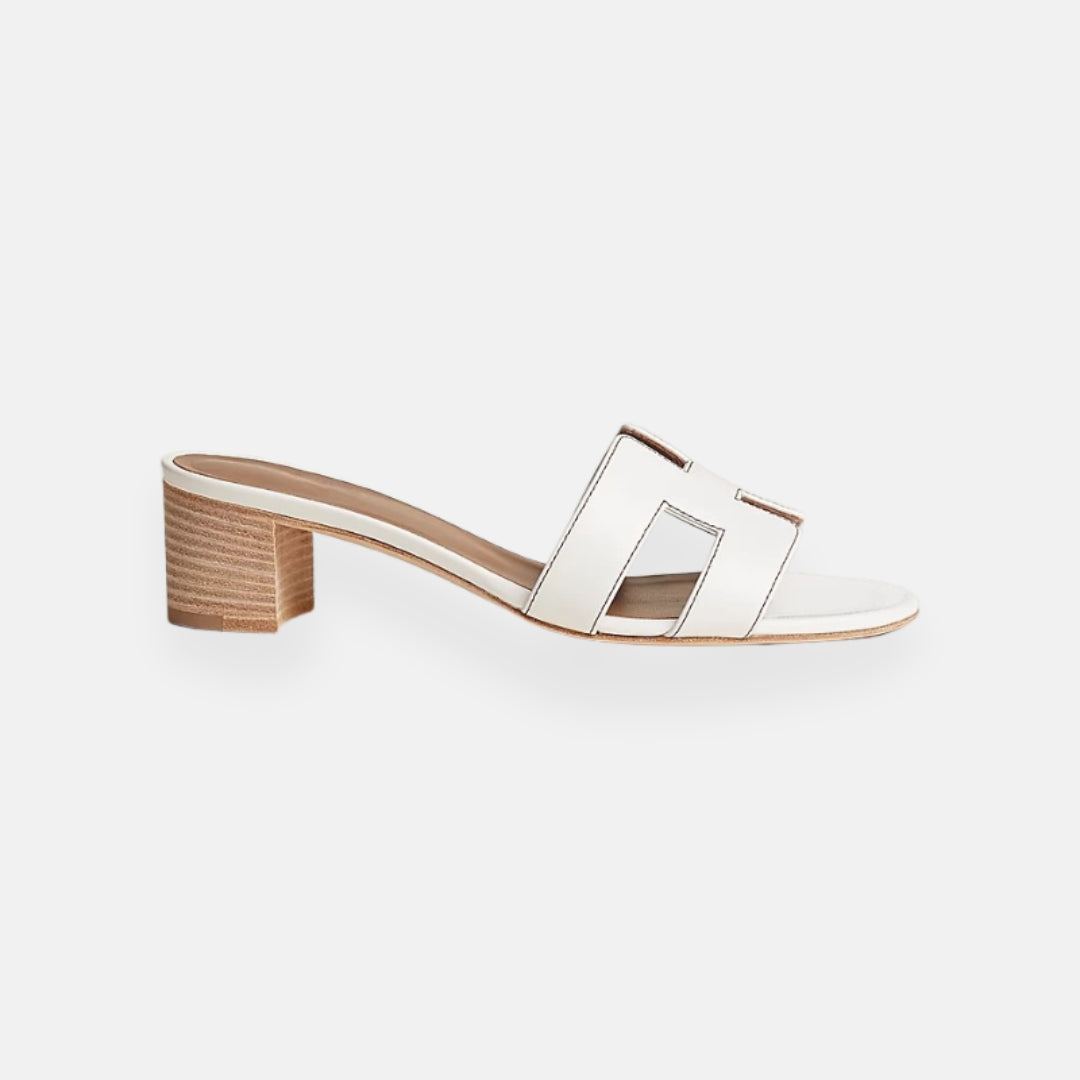 Clara – Mules traforate con tacco basso