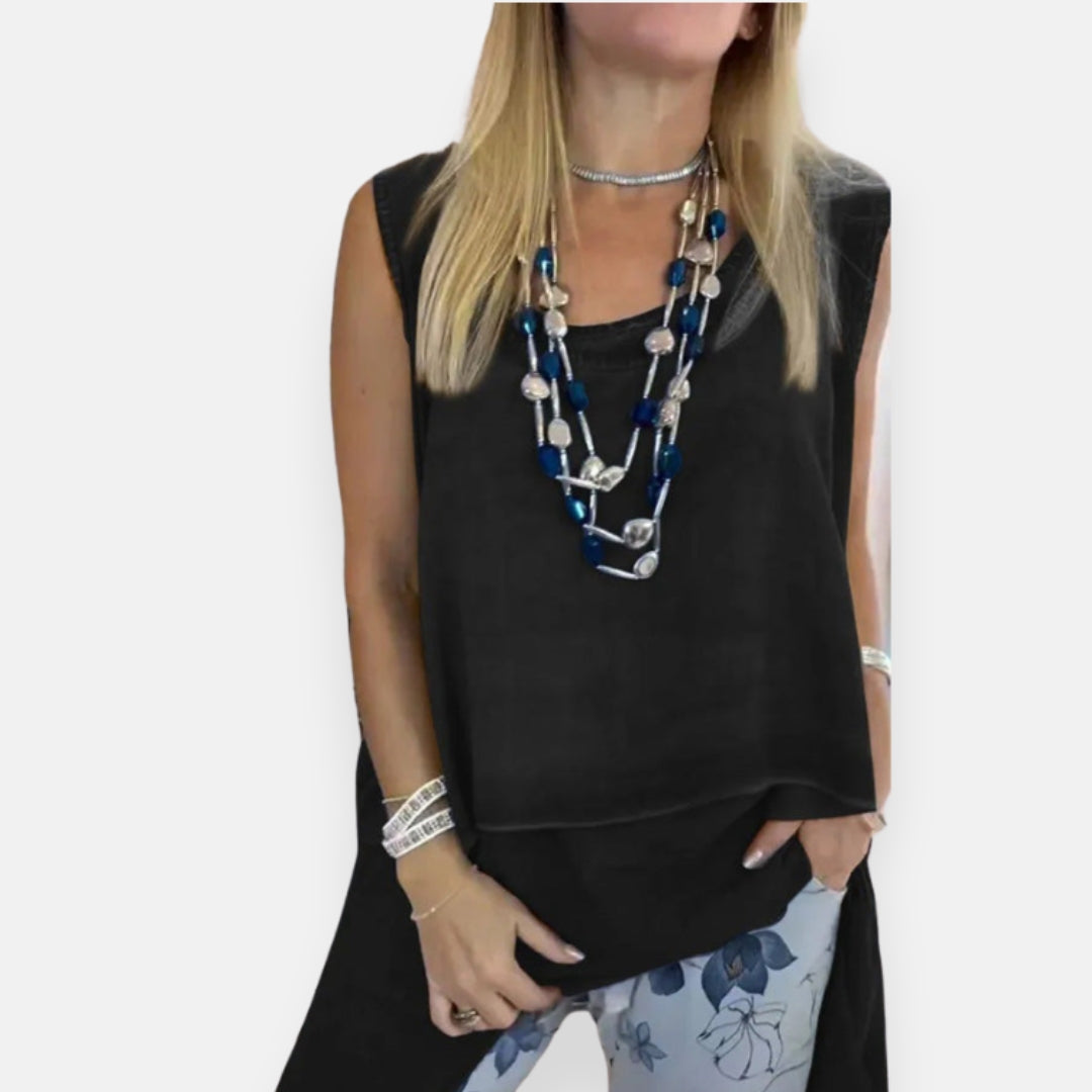 Olimpia – Top fluido a sovrapposizione elegante