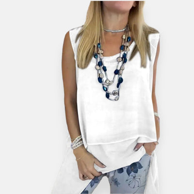 Olimpia – Top fluido a sovrapposizione elegante